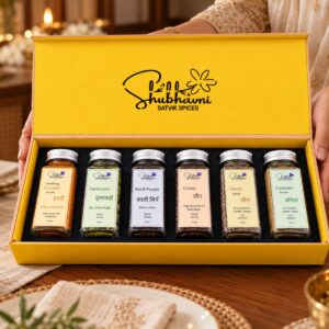 Shubhavni Satvik Spices box being presented at a festive dining table