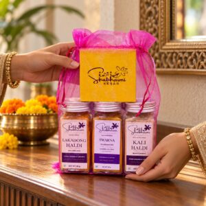 Shubhavni Celebration Trio potli being placed on a festive table