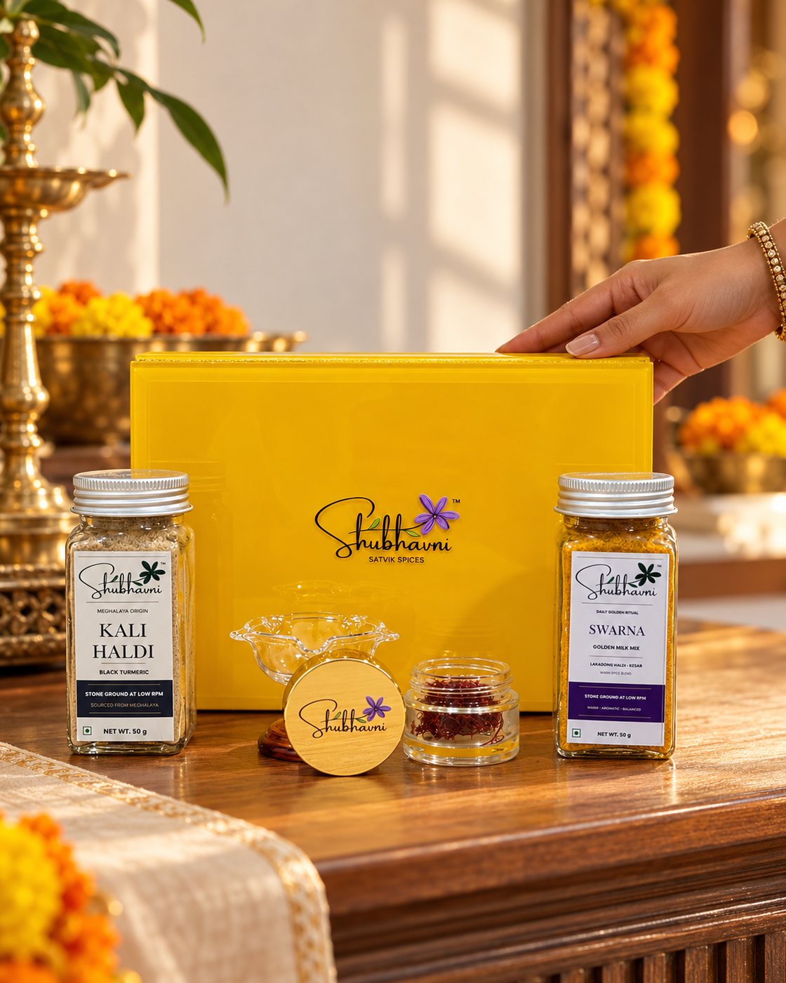 Shubhavni Celebration Box with Kali haldi, Swarna, kesar and a glass diya, set out for Diwali